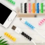 4 in 1 Silicone Cable Protector in assorted colors for universal wire management.